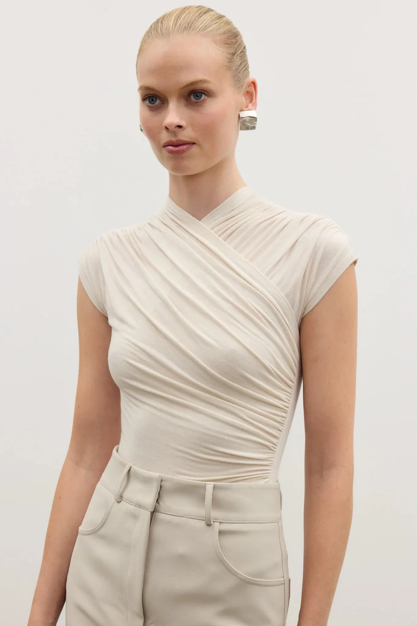 AMRITA SLEEVELESS BODYSUIT