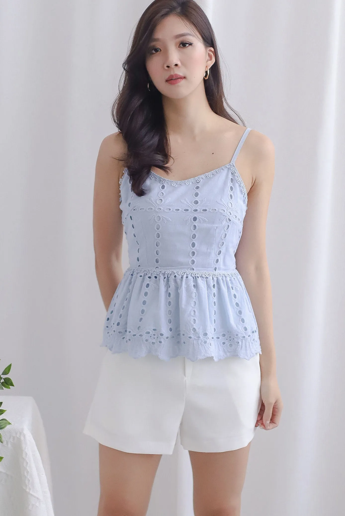 Arelis Eyelet Spag Peplum Top In Skyblue