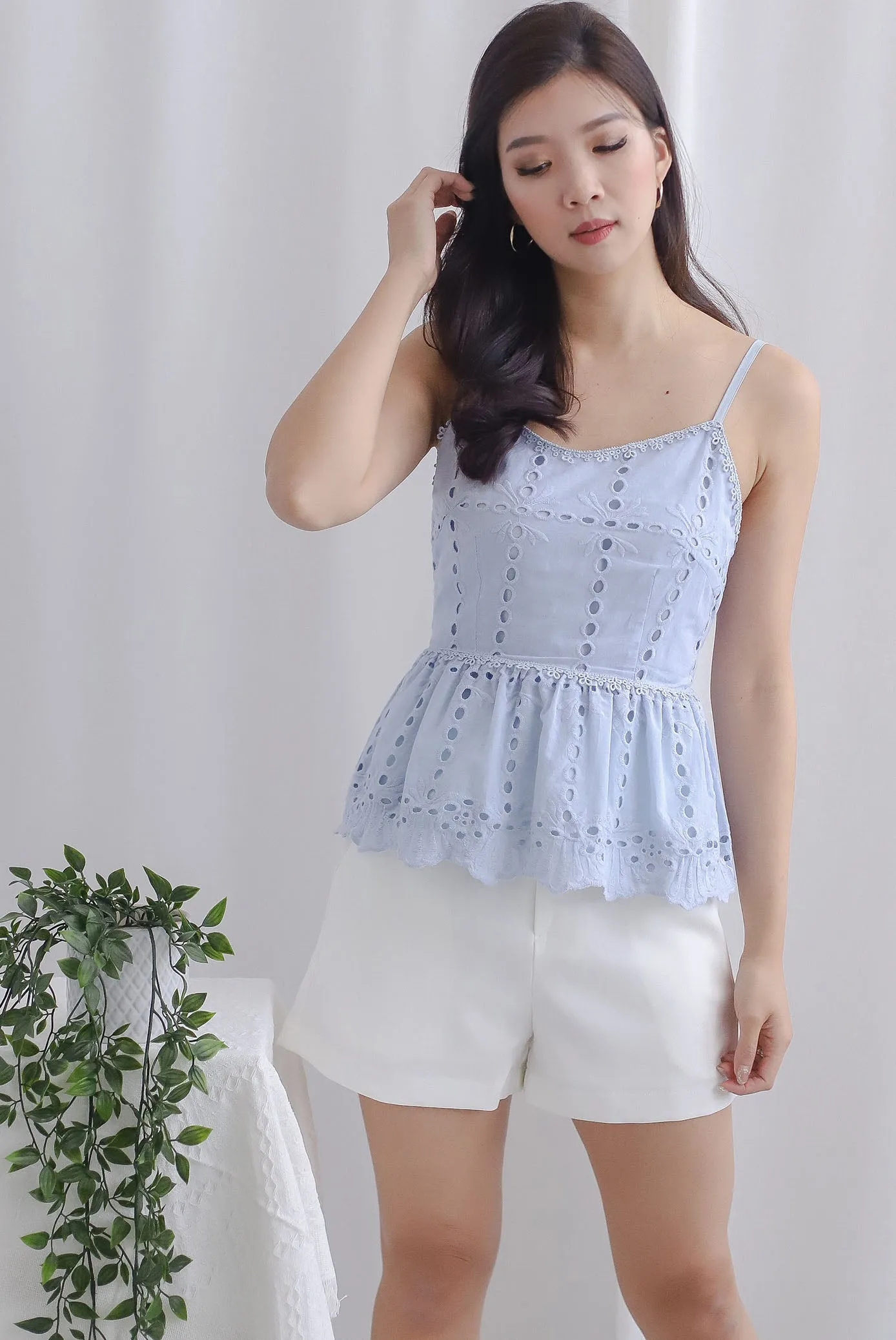 Arelis Eyelet Spag Peplum Top In Skyblue