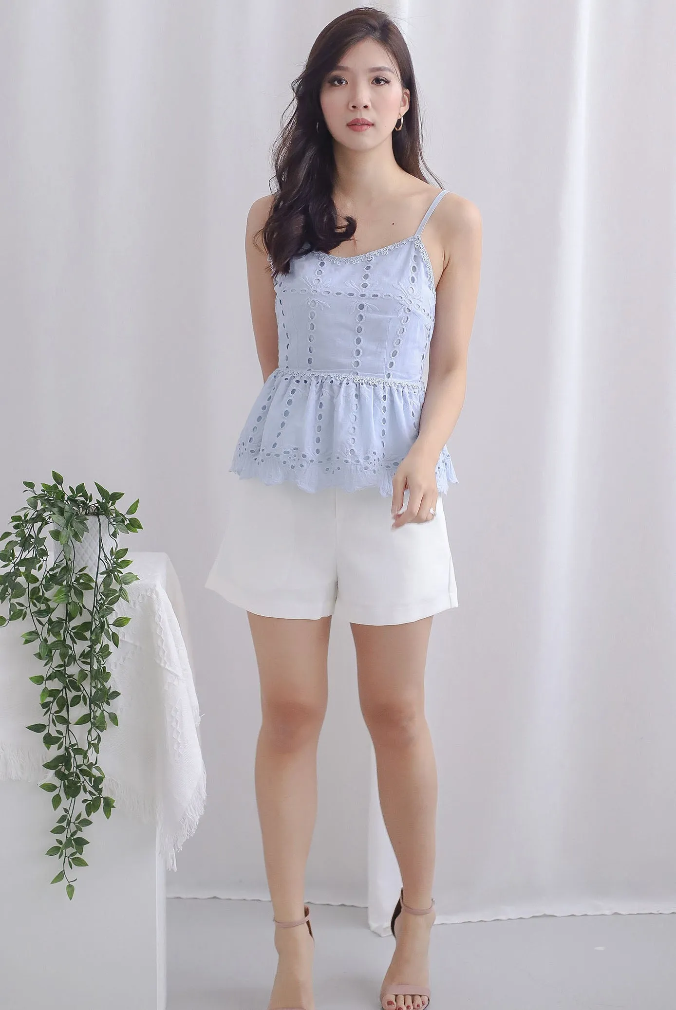 Arelis Eyelet Spag Peplum Top In Skyblue